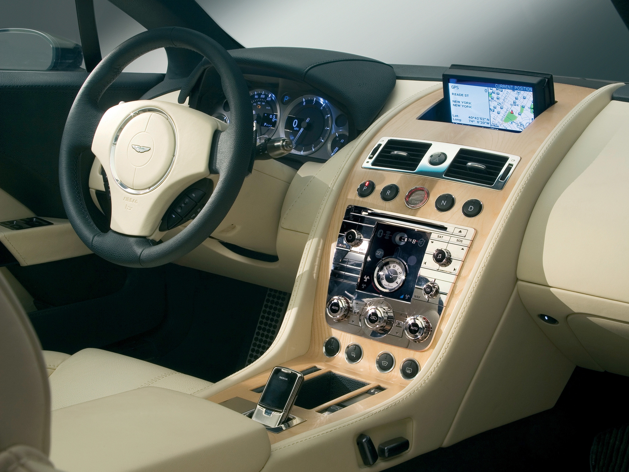 Скачать aston martin, rapide, 2006, бежевый, салон, интерьер, концепт кар, руль, спидометр обои на рабочий стол