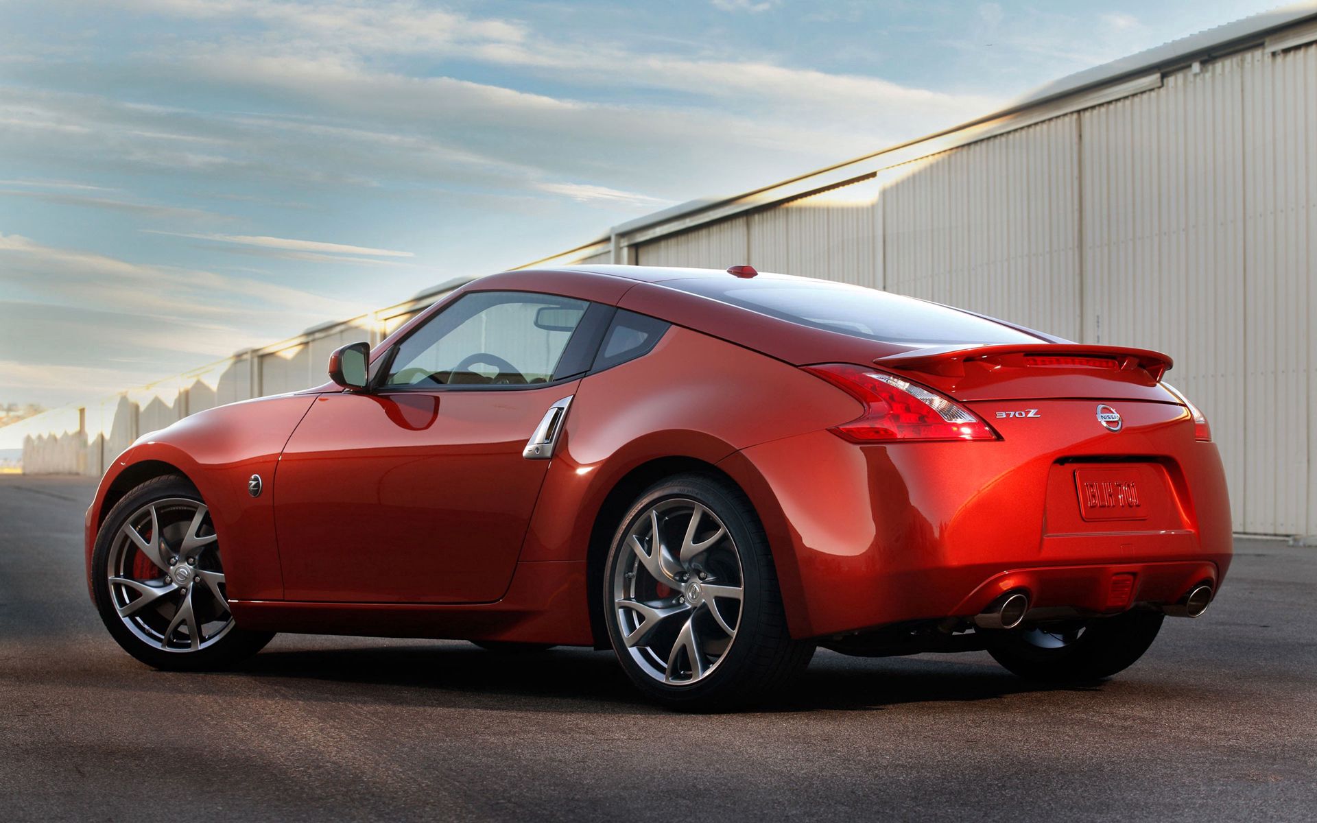 Скачать nissan, 350z, красный, вид сбоку обои на рабочий стол