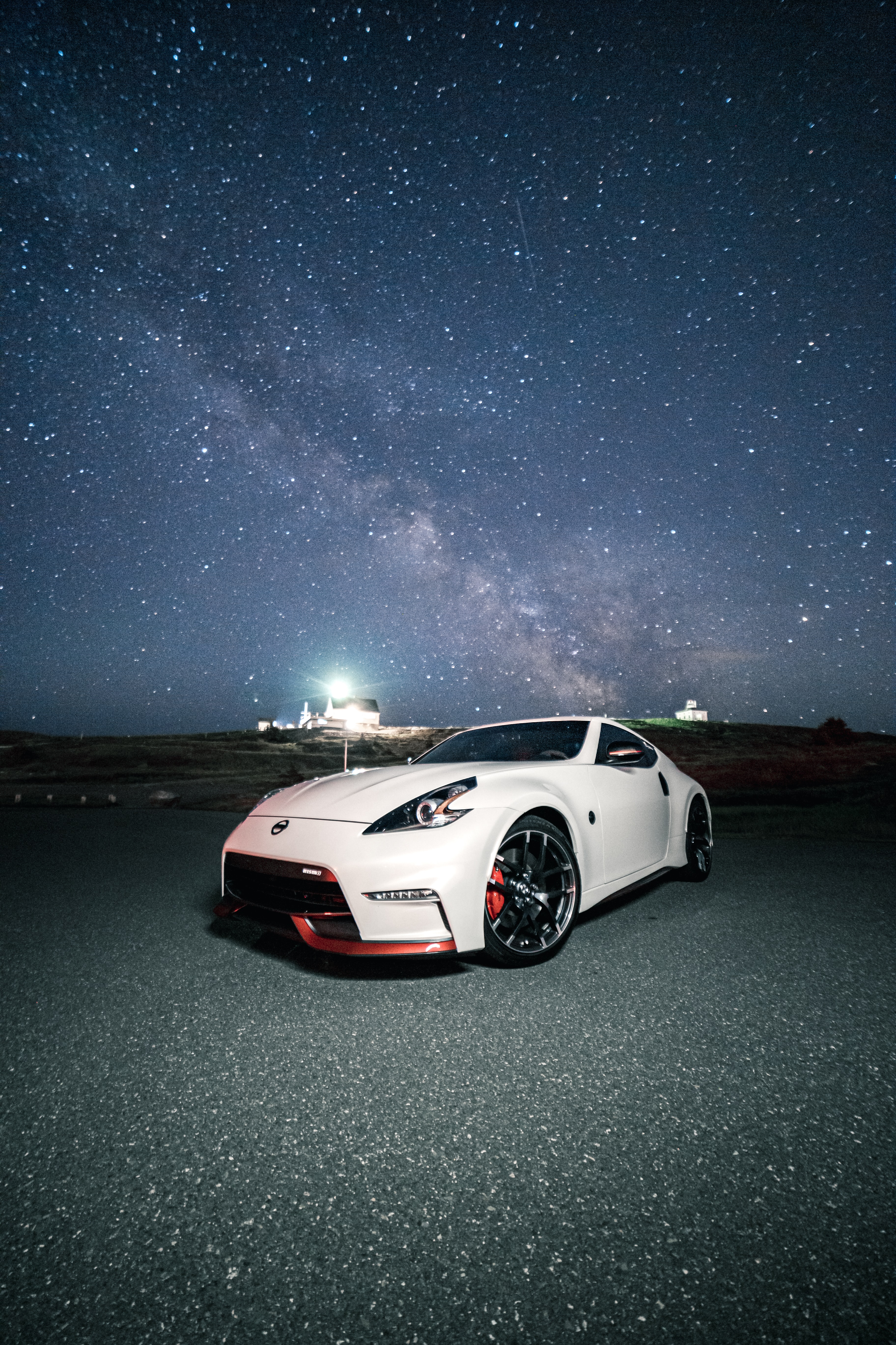 Скачать nissan 350z, nissan, спорткар, автомобиль, звездное небо обои для телефона