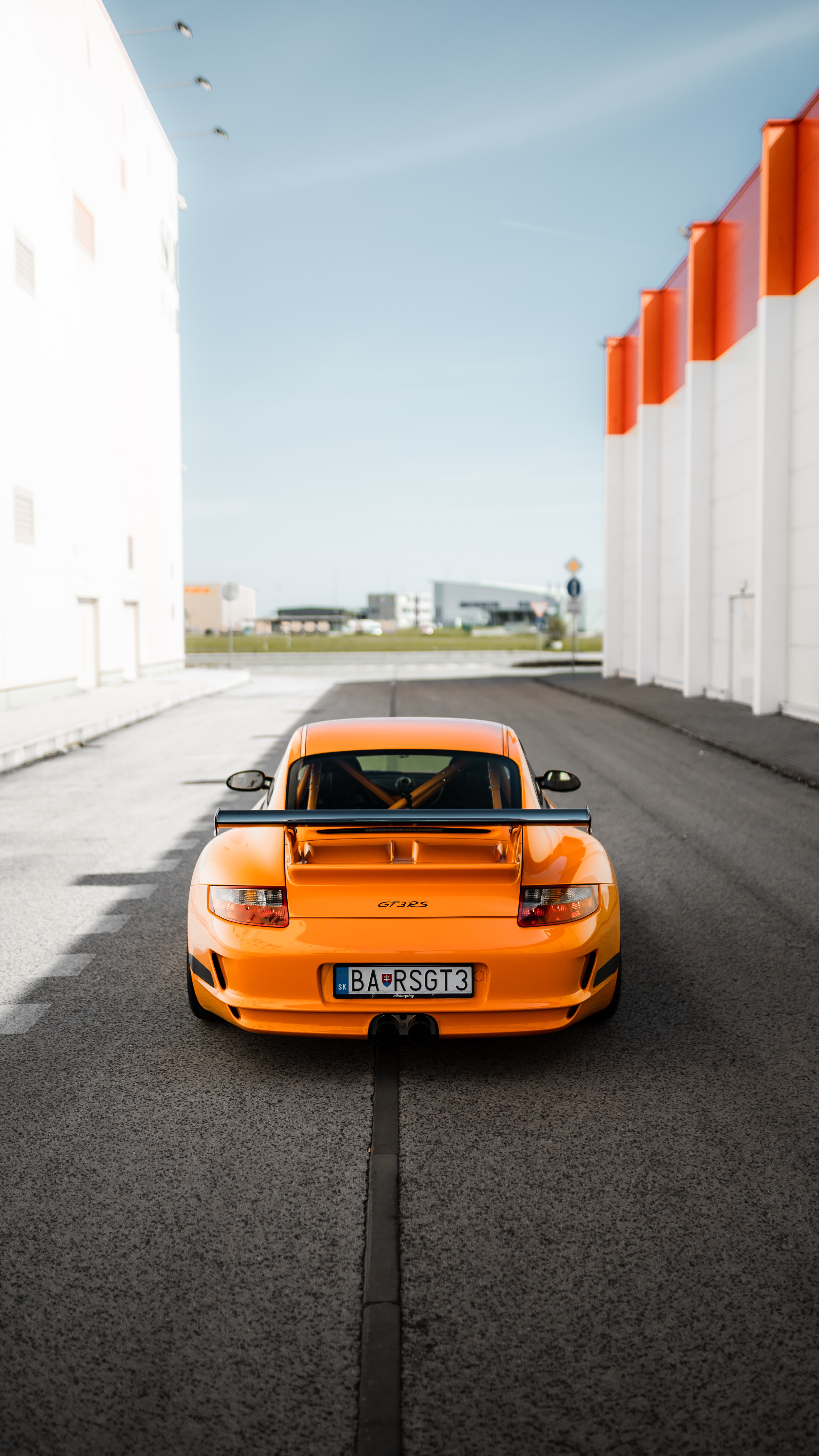 Скачать porsche 911 gt3 rs, porsche, автомобиль, оранжевый, вид сзади обои для телефона