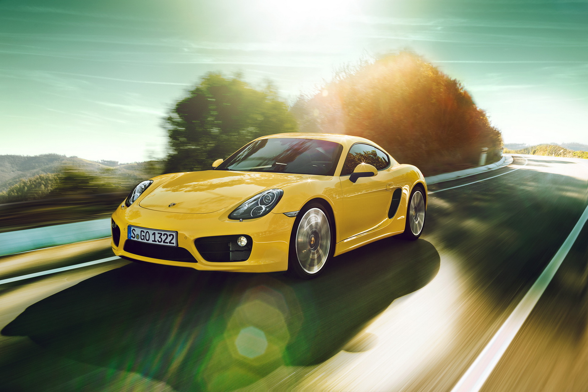 Скачать porsche cayman, желтый, движение, дорога, поворот обои на рабочий стол